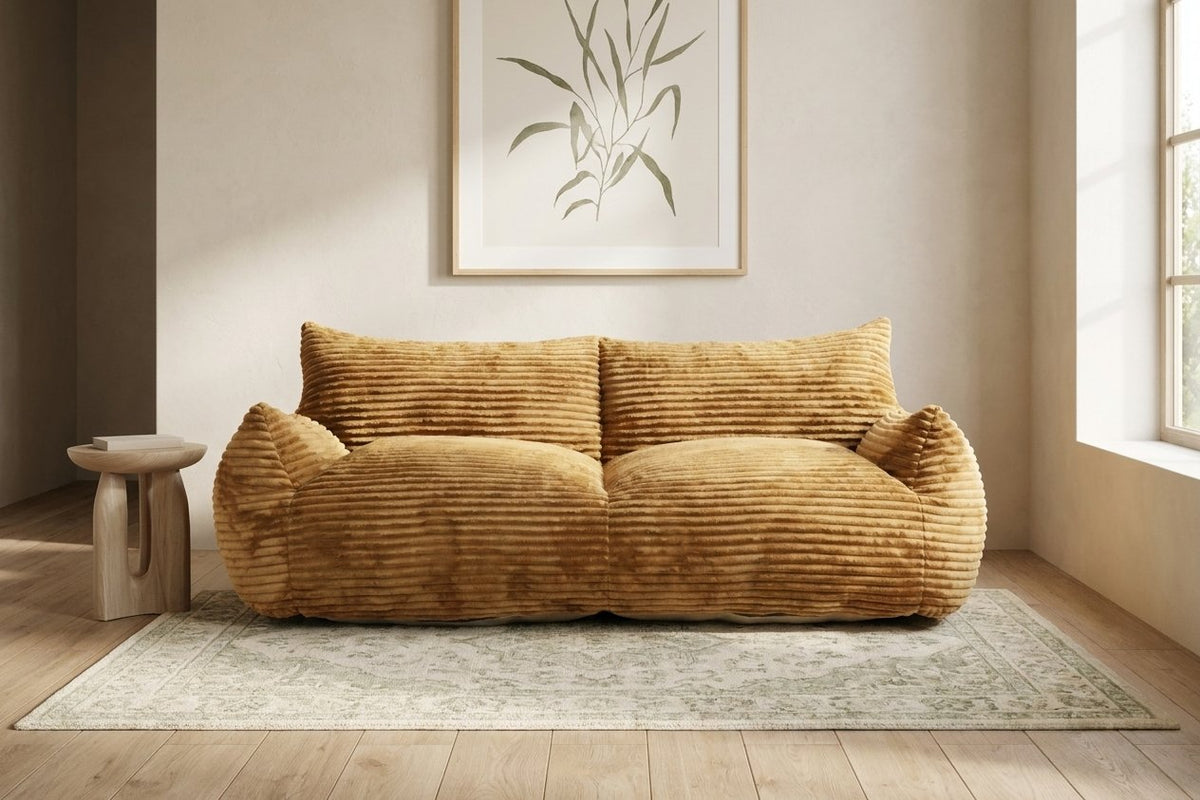 Canapé pouf Pola Duo caramel dans un salon lumineux
