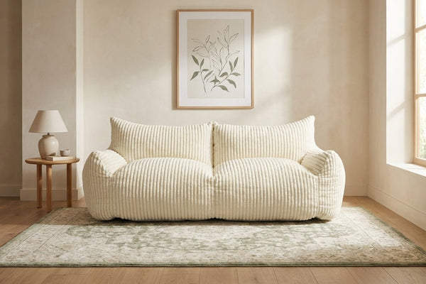 Canapé pouf Pola Duo blanc crème dans un salon lumineux