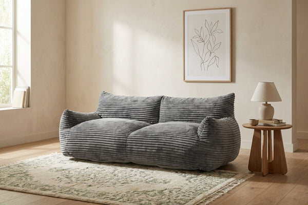Canapé pouf Pola Duo gris anthracite dans un salon lumineux