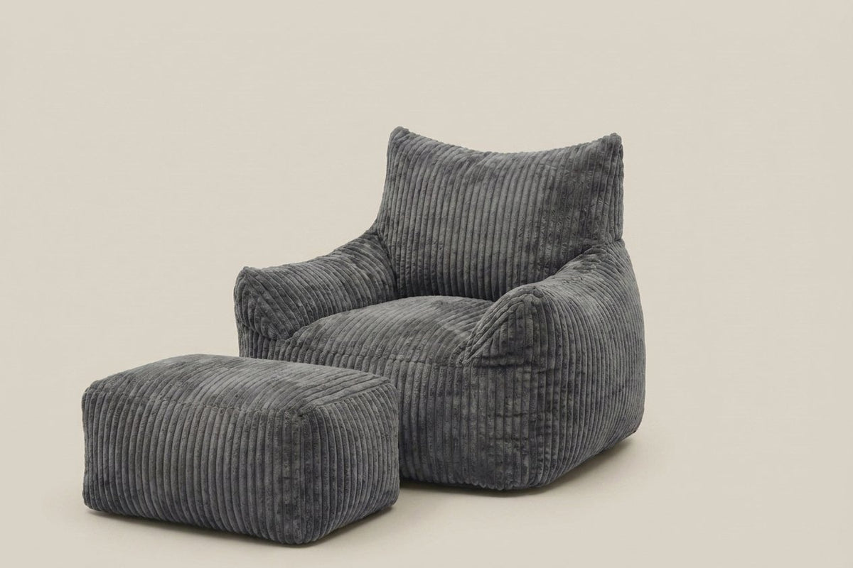Pola gris anthracite avec ottoman, vue de trois-quarts