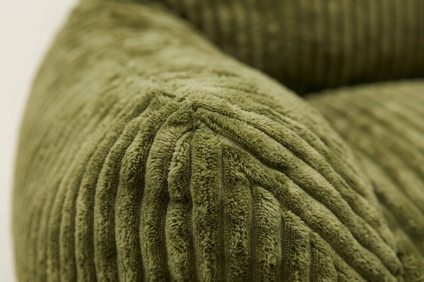 Pola vert amande avec ottoman, détail du velours côtelé