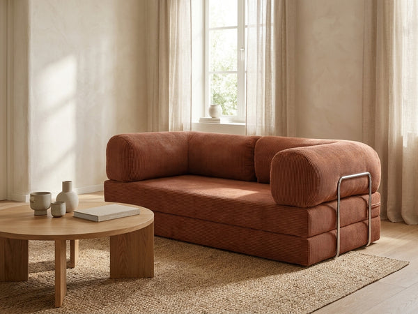 NORA canapé convertible terracotta dans un salon lumineux