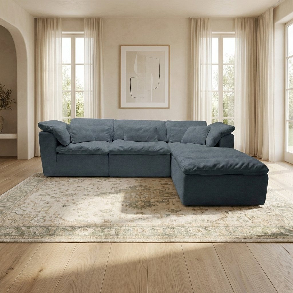 Canapé modulable Vela 4 modules bleu orage dans un salon lumineux